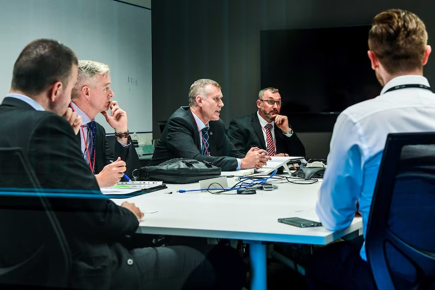 Professionals discussing AI risk and governance